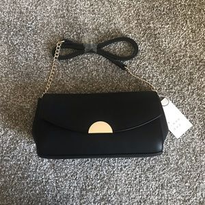 A New Day Black Clutch